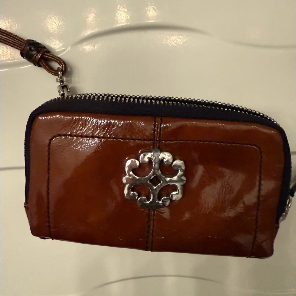 Brighton Shiny patent leather Brown Wristlet with Silver Emblem